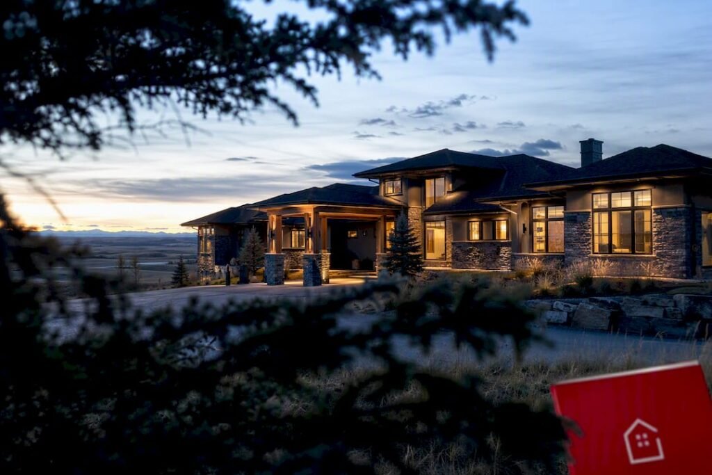 Luxury Calgary acreage home at dawn