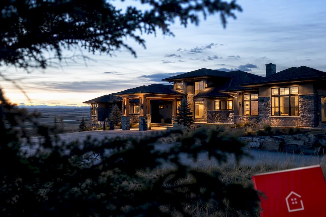 Luxury Calgary acreage home at dawn